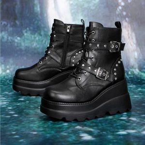 Platform ankle boots with buckles and studs